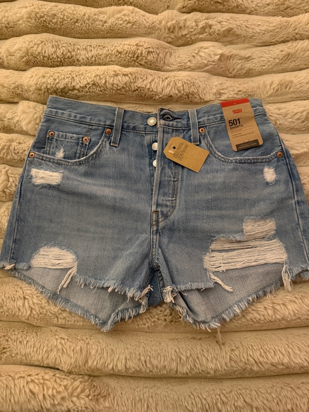 Levi's Women's 501 Distressed Light Blue Denim Shorts
